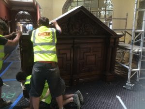 Careful removal of ancient fireplace