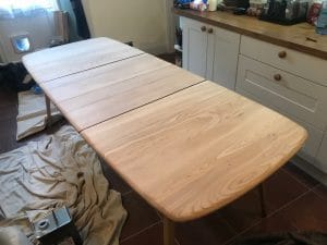 Half way through French Polisher repair of an Ercol table -sanded in preparation for polishing