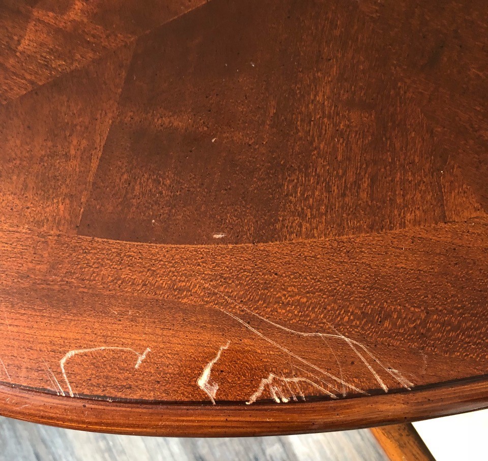 scratches on table fixed by french polisher