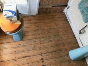 water damaged wooden floor